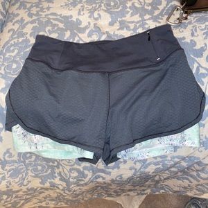 Grey Carrie Underwood sport shorts.